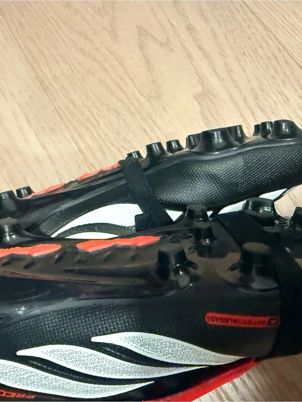 adidas Predator kids Soccer cleats in Black, Red & White